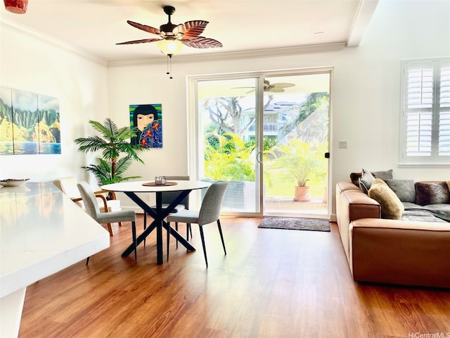 92-1087 Koio Drive M29-3 (Apt C), Kapolei, HI 96707 - dining space featuring a ceiling fan, wood finished floors, and ornamental molding