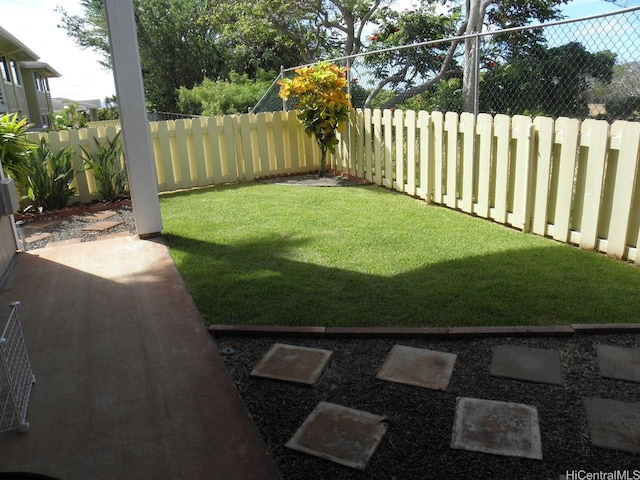 94-542 Kupuohi St Unit 103, Waipahu, HI 96797 - fenced backyard with a patio