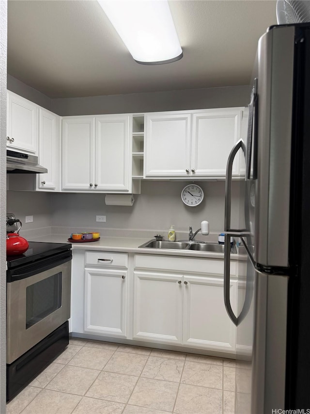 94-542 Kupuohi St Unit 103, Waipahu, HI 96797 - kitchen with stainless steel appliances, under cabinet range hood, white cabinetry, light countertops, and open shelves