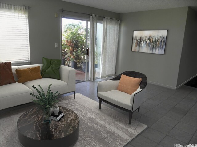 94-542 Kupuohi St Unit 103, Waipahu, HI 96797 - living area with tile patterned floors