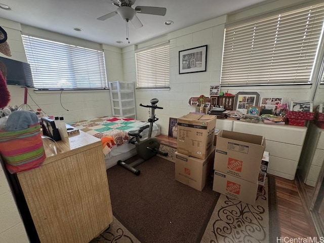 99-146 Kulina St, Aiea, HI 96701 - bedroom featuring concrete block wall and wood finished floors