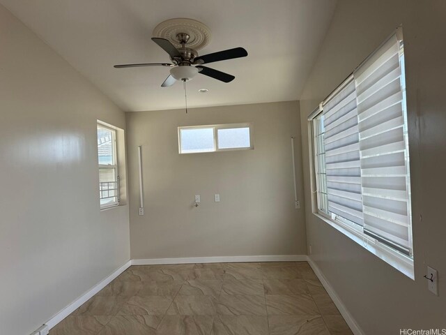 99-146 Kulina St, Aiea, HI 96701 - spare room featuring marble finish flooring and a ceiling fan