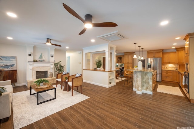 46-259 Kalali St, Kaneohe, HI 96744 - living area with ceiling fan, a tile fireplace, recessed lighting, and dark wood-type flooring