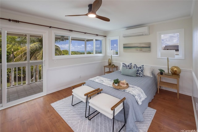 46-259 Kalali St, Kaneohe, HI 96744 - bedroom with a wall mounted air conditioner, access to outside, a wainscoted wall, ornamental molding, and wood finished floors