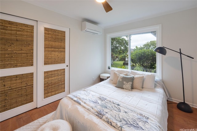 46-259 Kalali St, Kaneohe, HI 96744 - bedroom with a wall mounted AC, wood finished floors, crown molding, and a ceiling fan