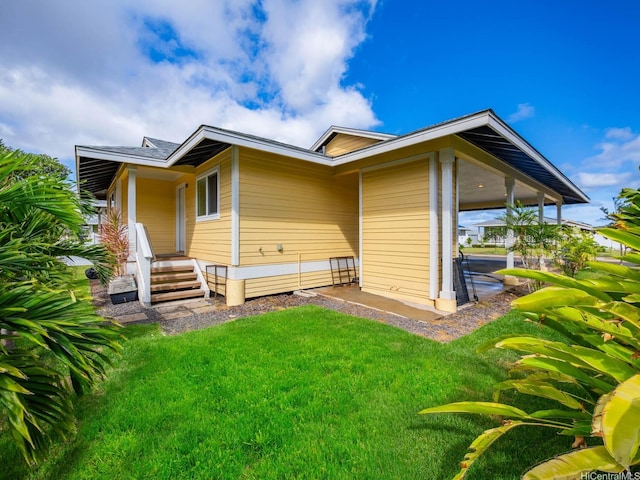 91-1348 Kakiwi St, Ewa Beach, HI 96706 - view of home's exterior with a yard