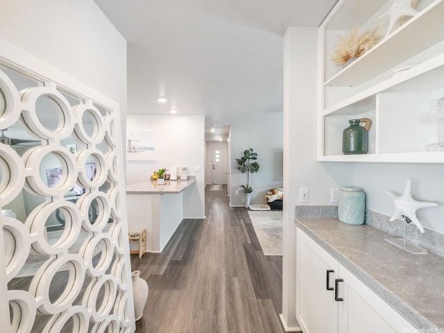 91-1348 Kakiwi St, Ewa Beach, HI 96706 - bar featuring dark wood-style flooring and recessed lighting