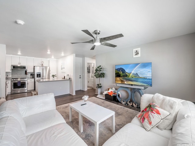 91-1348 Kakiwi St, Ewa Beach, HI 96706 - living area featuring wood finished floors, ceiling fan, and recessed lighting