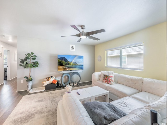 91-1348 Kakiwi St, Ewa Beach, HI 96706 - living room featuring wood finished floors and ceiling fan