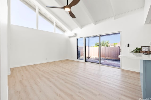 94-431 Keaoopua St Unit 104, Mililani, HI 96789 - unfurnished room with high vaulted ceiling, ceiling fan, beam ceiling, light wood-type flooring, and an AC wall unit