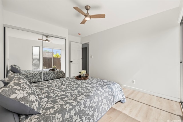 94-431 Keaoopua St Unit 104, Mililani, HI 96789 - bedroom featuring wood finished floors, ceiling fan, and a closet