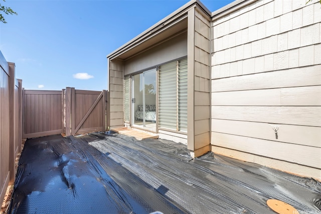94-431 Keaoopua St Unit 104, Mililani, HI 96789 - wooden terrace featuring a gate