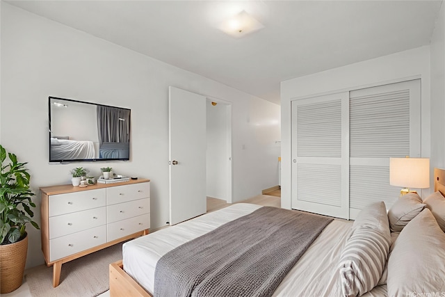 94-1079 Kepakepa St Unit H8, Waipahu, HI 96797 - bedroom with a closet and light wood-style flooring