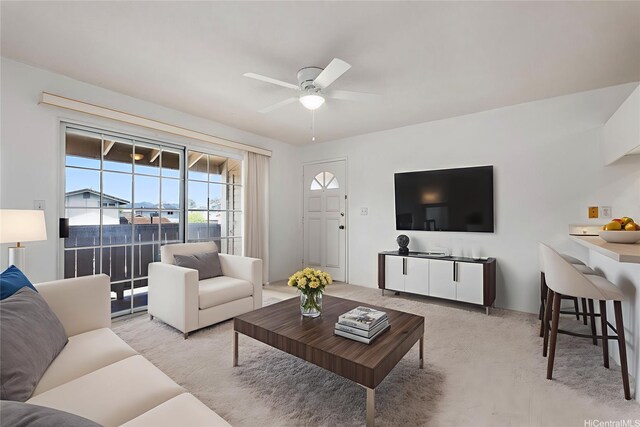 94-1079 Kepakepa St Unit H8, Waipahu, HI 96797 - carpeted living area with a ceiling fan and plenty of natural light