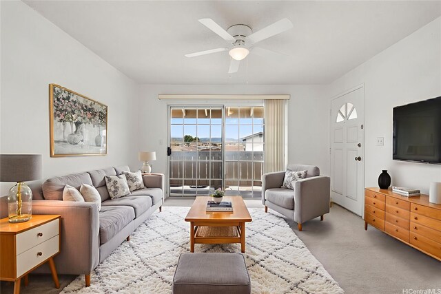 94-1079 Kepakepa St Unit H8, Waipahu, HI 96797 - living area featuring a ceiling fan, plenty of natural light, and carpet