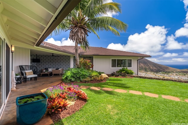 1034 Kaumoku St, Honolulu, HI 96825 - view of grassy yard featuring a patio