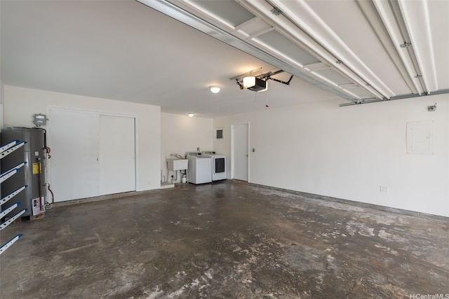 1034 Kaumoku St, Honolulu, HI 96825 - garage featuring a garage door opener, washing machine and dryer, electric water heater, and electric panel