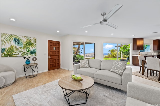 1034 Kaumoku St, Honolulu, HI 96825 - living area featuring light wood-style flooring, recessed lighting, and a ceiling fan