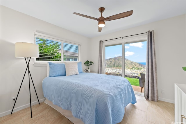 1034 Kaumoku St, Honolulu, HI 96825 - bedroom with access to outside, a mountain view, and ceiling fan