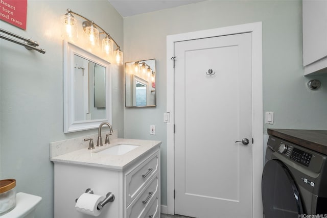 7780 Waikapu Loop, Honolulu, HI 96825 - bathroom featuring washer / clothes dryer and vanity