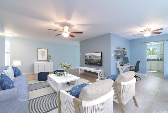 1335 Onioni St, Kailua, HI 96734 - living area with a ceiling fan, a desk, and light tile patterned flooring