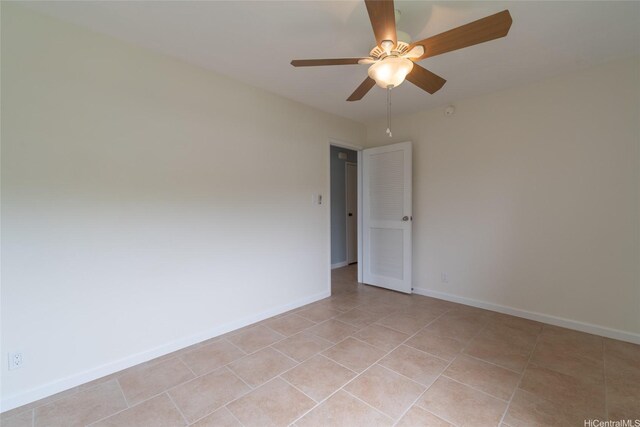 1335 Onioni St, Kailua, HI 96734 - spare room featuring a ceiling fan and light tile patterned flooring