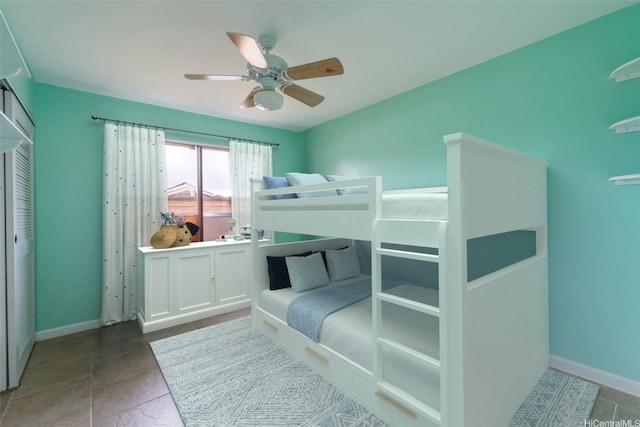 1335 Onioni St, Kailua, HI 96734 - tiled bedroom with baseboards and a ceiling fan