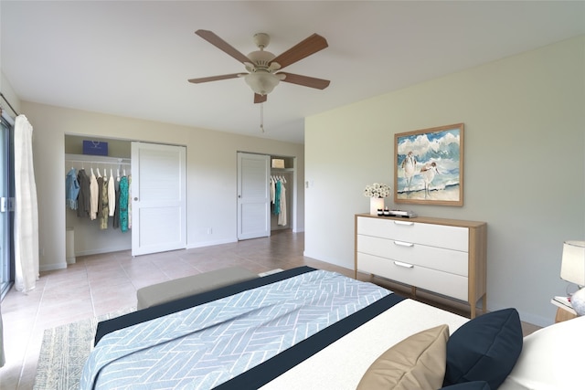 1335 Onioni St, Kailua, HI 96734 - tiled bedroom with two closets and a ceiling fan