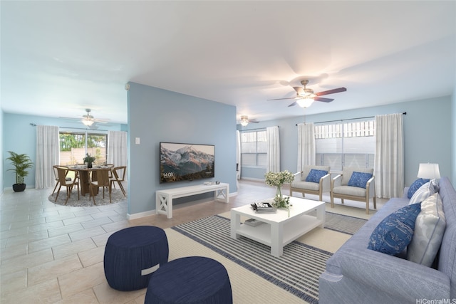 1335 Onioni St, Kailua, HI 96734 - living area featuring a ceiling fan and baseboards