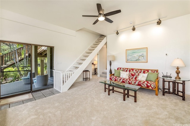 5926 Kalanianaole Hwy, Honolulu, HI 96821 - tiled living area featuring stairway, carpet floors, track lighting, and ceiling fan
