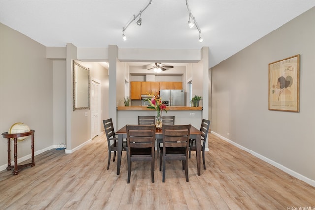 1020 Aoloa Pl Unit 311B, Kailua, HI 96734 - dining room with light wood-style floors and ceiling fan