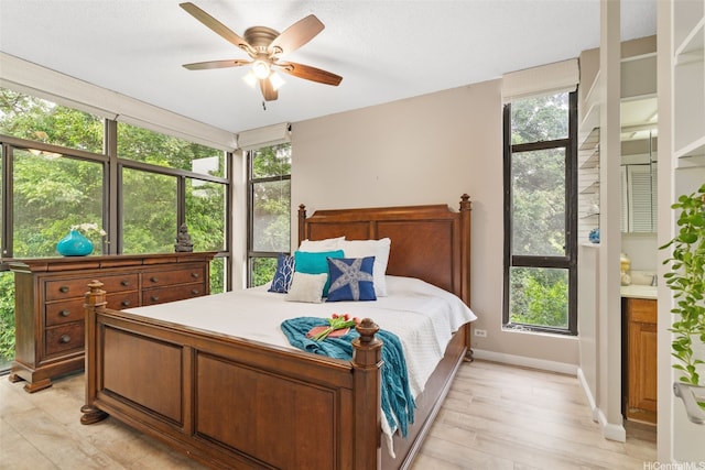 1020 Aoloa Pl Unit 311B, Kailua, HI 96734 - bedroom with a ceiling fan and light wood finished floors