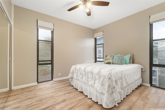1020 Aoloa Pl Unit 311B, Kailua, HI 96734 - bedroom with light wood finished floors and ceiling fan