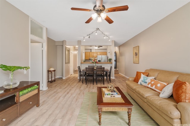 1020 Aoloa Pl Unit 311B, Kailua, HI 96734 - living room with ceiling fan, light wood-style flooring, and track lighting