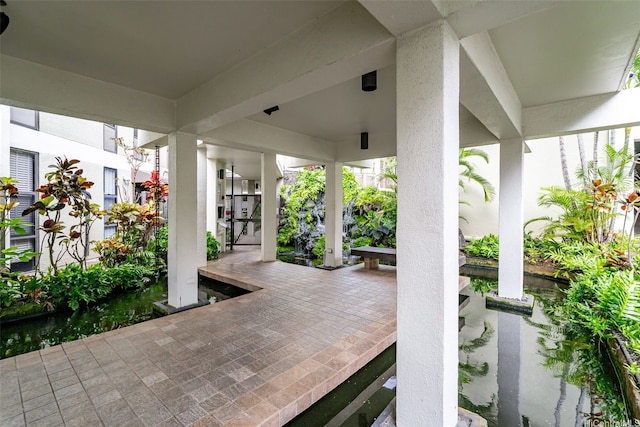 1020 Aoloa Pl Unit 311B, Kailua, HI 96734 - view of patio / terrace featuring a water view