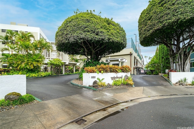 1020 Aoloa Pl Unit 311B, Kailua, HI 96734 - view of front of house featuring driveway and stucco siding