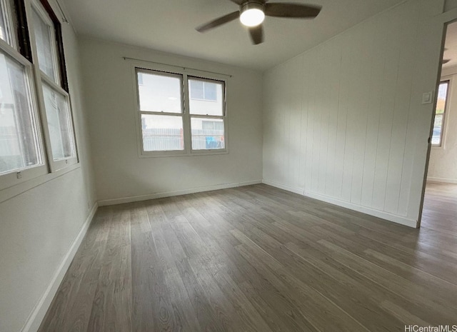 631 Hausten St Unit 2, Honolulu, HI 96826 - empty room featuring wood finished floors and ceiling fan