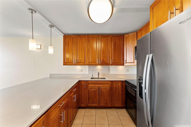 46-255 Kahuhipa St Unit A1100, Kaneohe, HI 96744 - kitchen with stainless steel fridge, double oven range, light countertops, and brown cabinetry