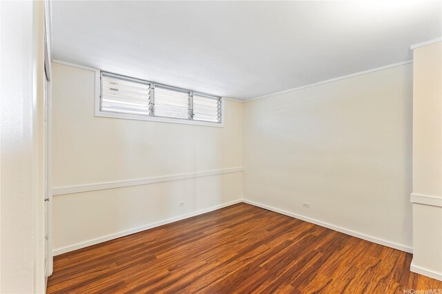 46-255 Kahuhipa St Unit A1100, Kaneohe, HI 96744 - spare room featuring wood finished floors and crown molding