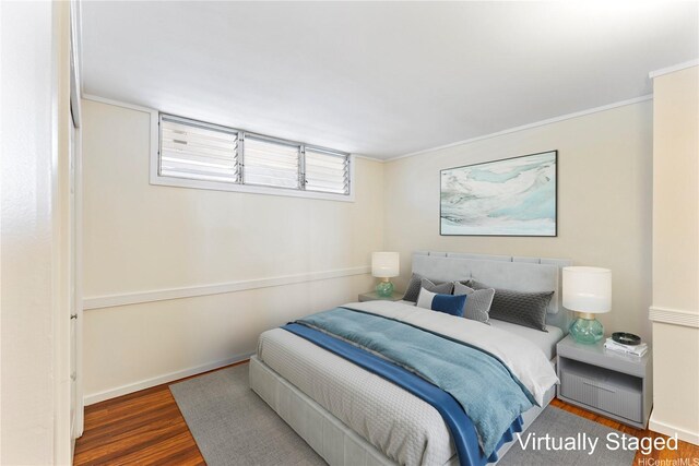 46-255 Kahuhipa St Unit A1100, Kaneohe, HI 96744 - bedroom with wood finished floors and crown molding