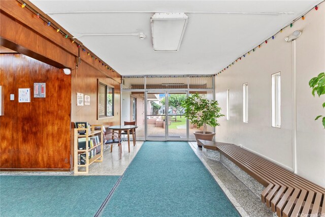 46-255 Kahuhipa St Unit A1100, Kaneohe, HI 96744 - building lobby featuring wooden walls