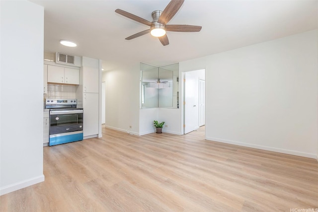 402 Iolani Ave Unit 204, Honolulu, HI 96813 - unfurnished living room featuring ceiling fan and light wood-style flooring