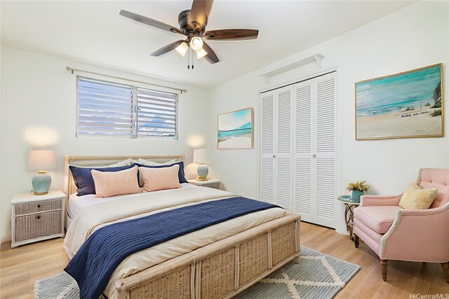 402 Iolani Ave Unit 204, Honolulu, HI 96813 - bedroom with a closet, light wood finished floors, and a ceiling fan