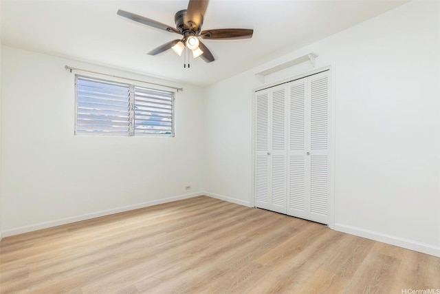 402 Iolani Ave Unit 204, Honolulu, HI 96813 - unfurnished bedroom featuring light wood-style floors, a closet, and a ceiling fan