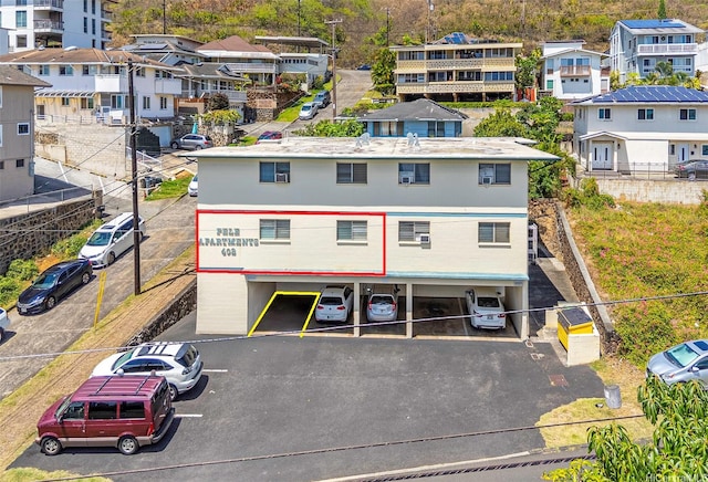 402 Iolani Ave Unit 204, Honolulu, HI 96813 - view of building exterior featuring covered parking