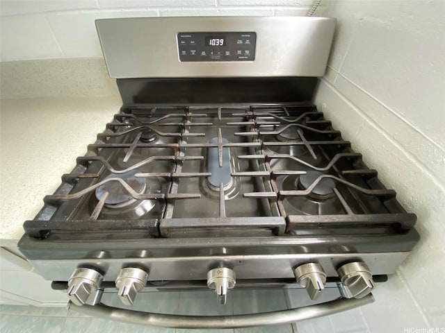 1118 Pua Ln Unit 113, Honolulu, HI 96817 - kitchen view of stainless steel range with gas stovetop