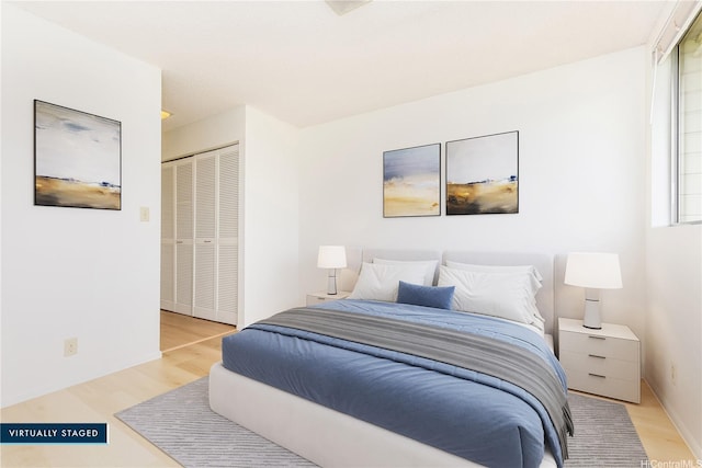 95-670 Hanile St Unit A202, Mililani, HI 96789 - bedroom with wood finished floors and a closet