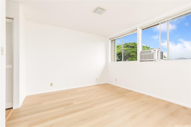 95-670 Hanile St Unit A202, Mililani, HI 96789 - unfurnished bedroom with wood finished floors and baseboards