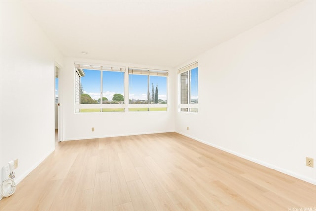 95-670 Hanile St Unit A202, Mililani, HI 96789 - empty room featuring light wood-style flooring and baseboards