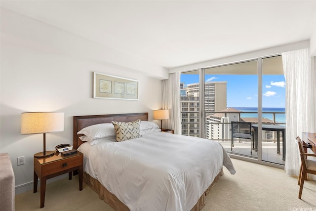 223 Saratoga Rd Unit 1916, Honolulu, HI 96815 - carpeted bedroom with access to exterior and a water view